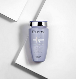 Lilla flaske med shampoo